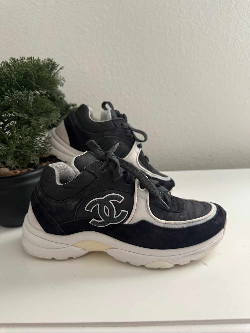 CHANEL Black and White Logo Sneakers